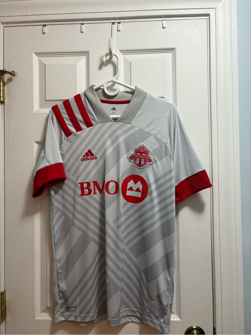 adidas Light Gray Soccer Jersey with Red Trim